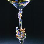 Fender Bender Martini 1993
Solid glass guitar with multi-colored inclusions 11 x 5.5 x 5.5 inches